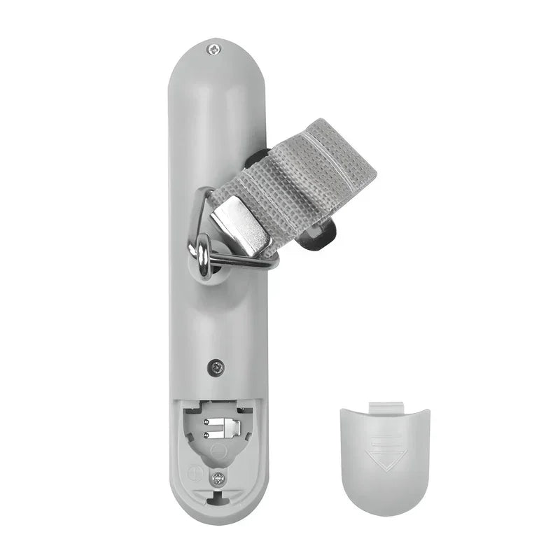 Gray child safety lock latch with strap and open battery compartment, white background